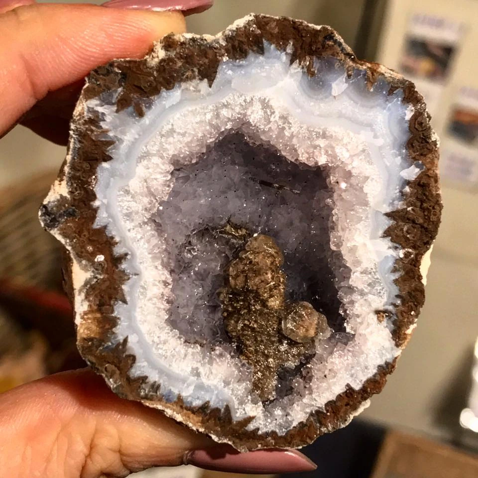Inside of a freshly cracked geode at Crystal Caves