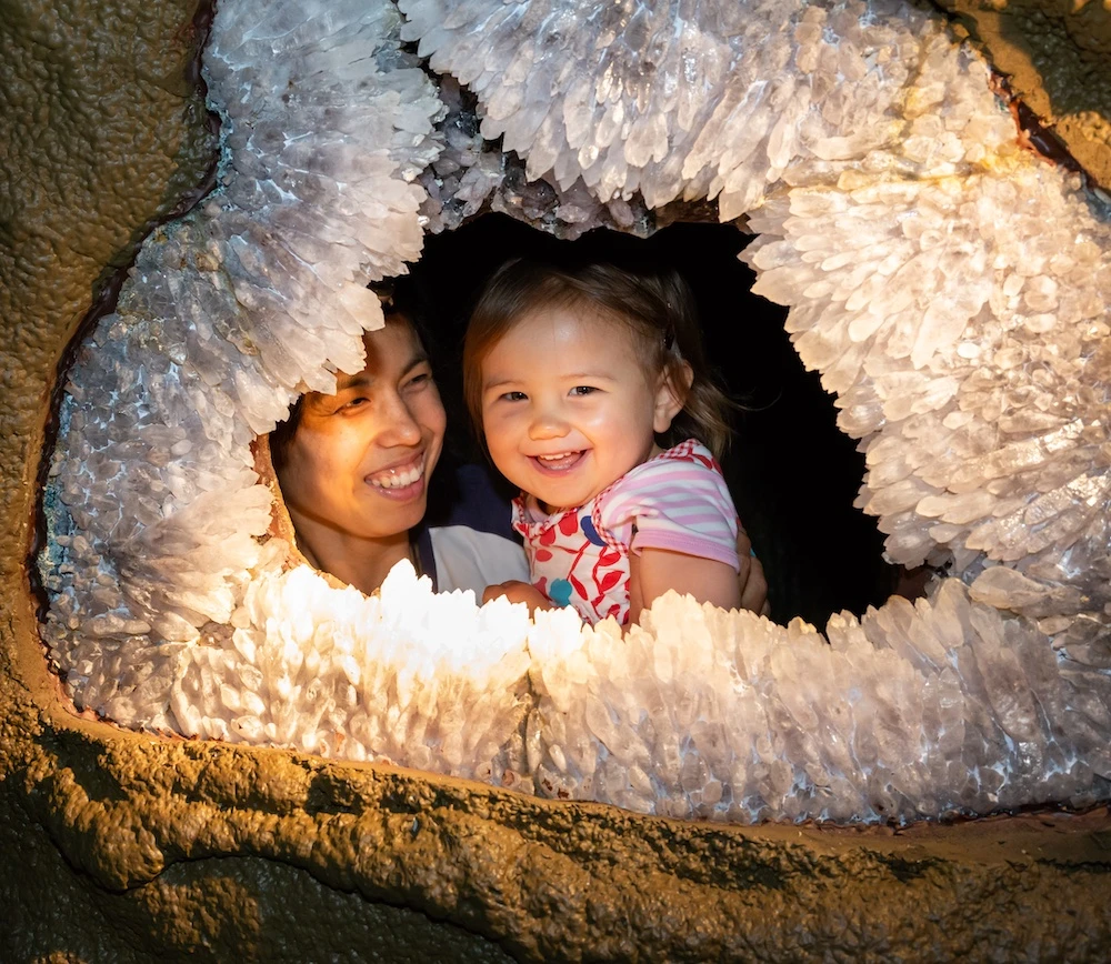 A family enjoying the Crystal Caves together