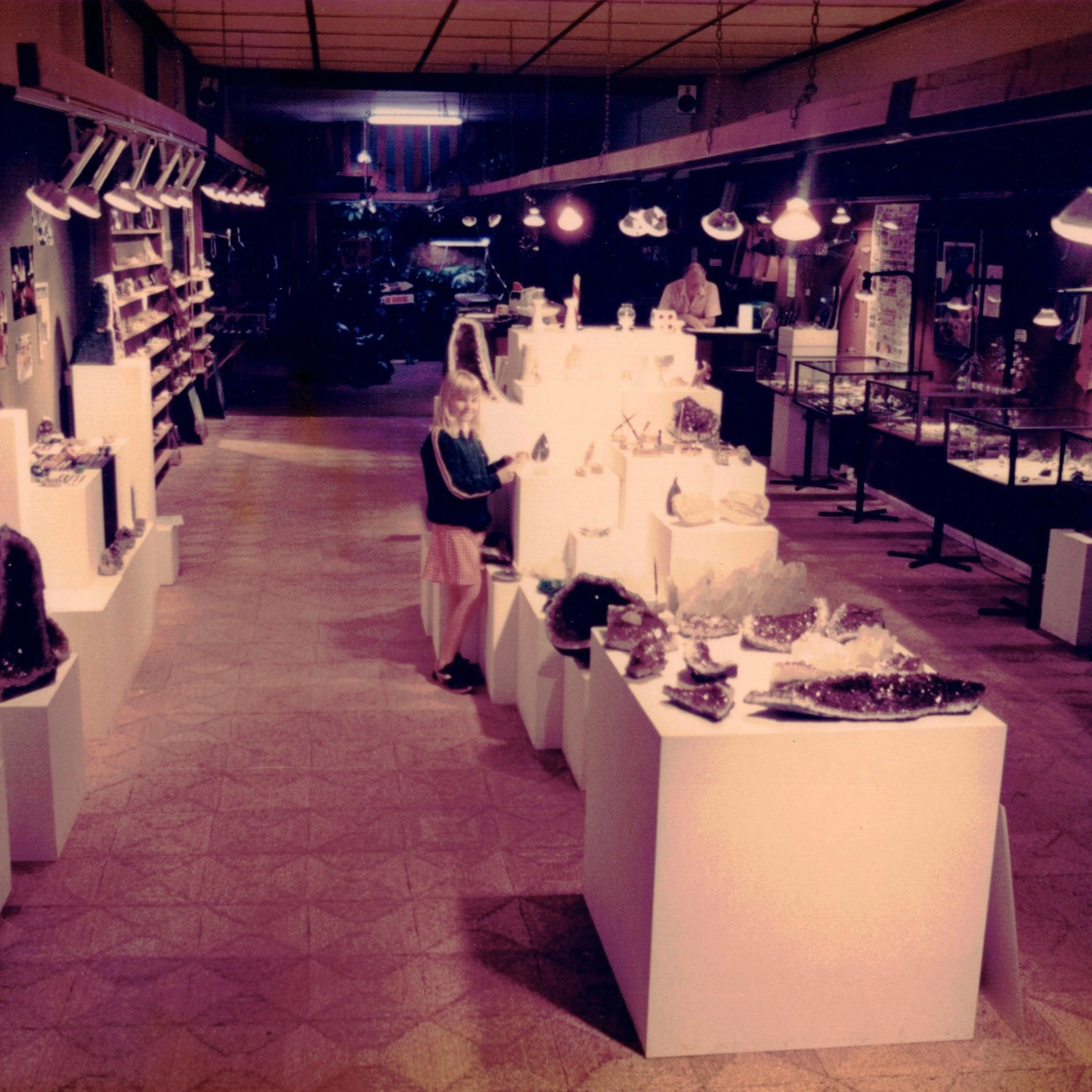 Inside the original Fascinating Facets shop in Atherton, with crystal displays on white pedestals