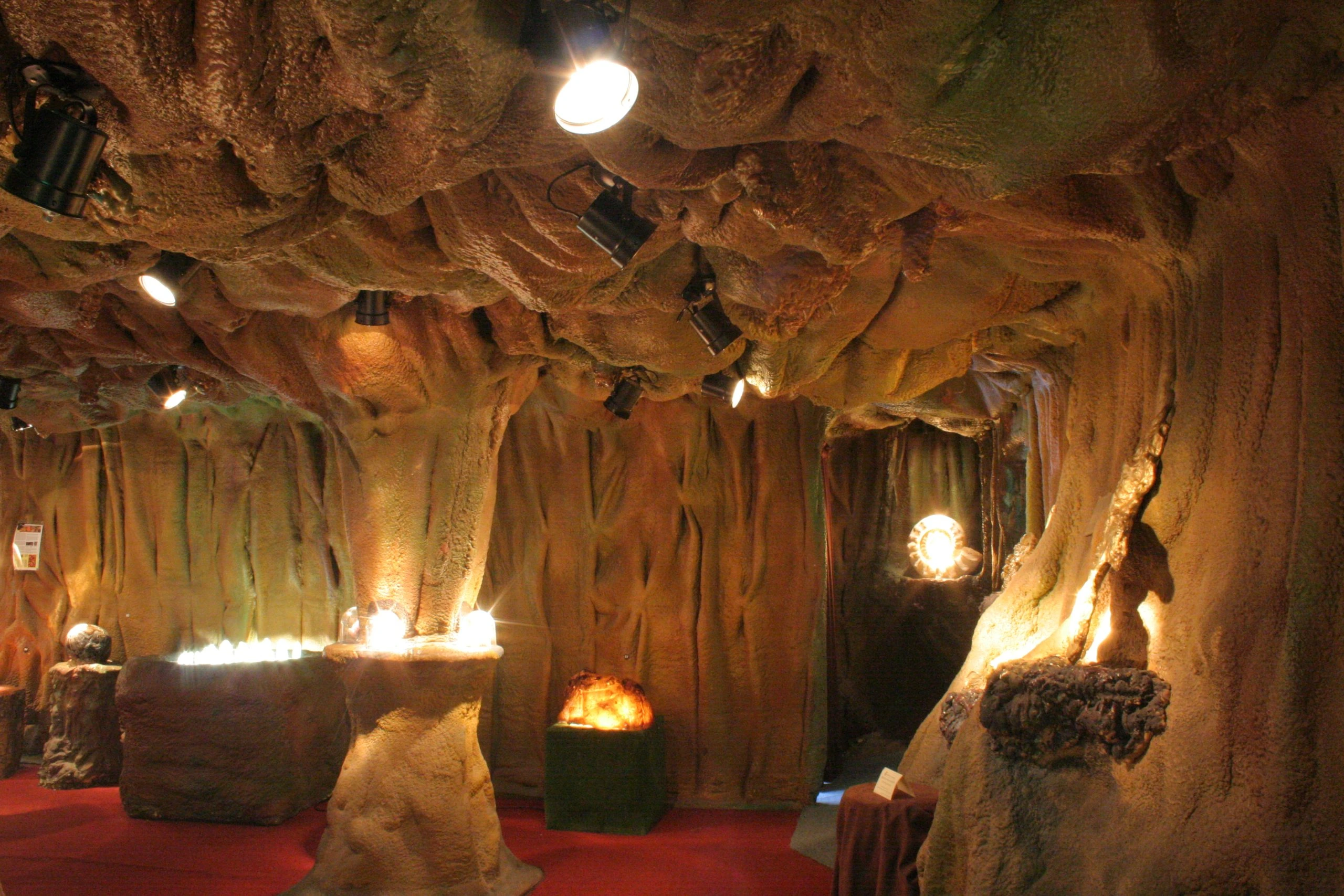 Inside the completed Crystal Caves with multiple chambers and lit displays
