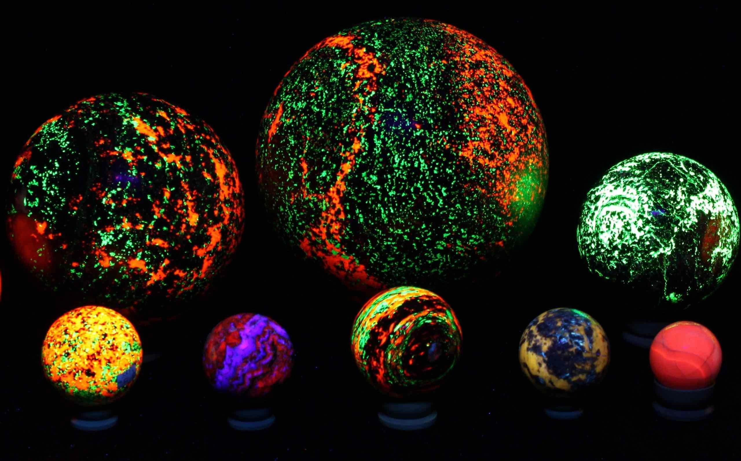 The Magic Spheres glowing under ultraviolet light